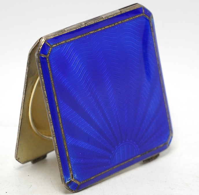 A George V silver and blue guilloche enamel compact by Asprey & Co, Birmingham, 1933, 72mm. Condition - poor
